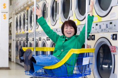 free and laughing at the laundromat
